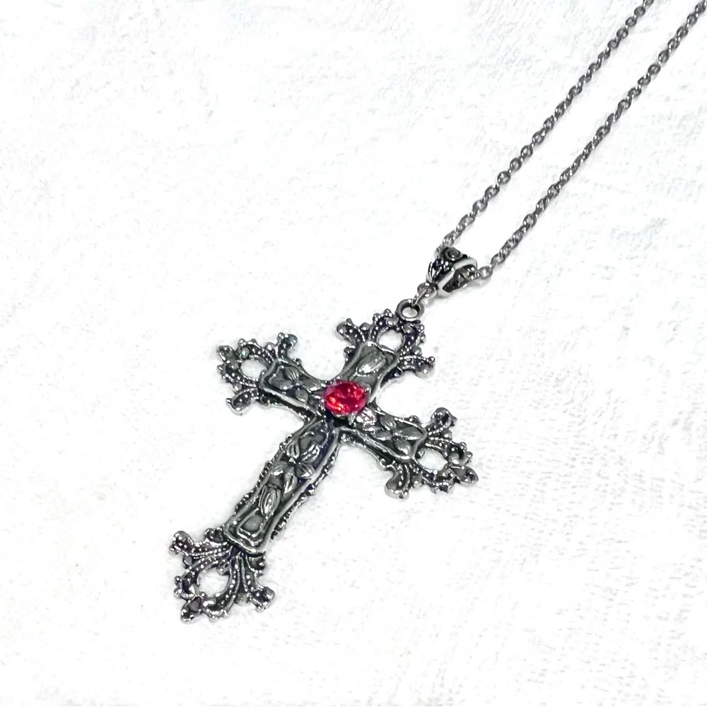 Silver Toned Cross Pendant with Red Gemstone